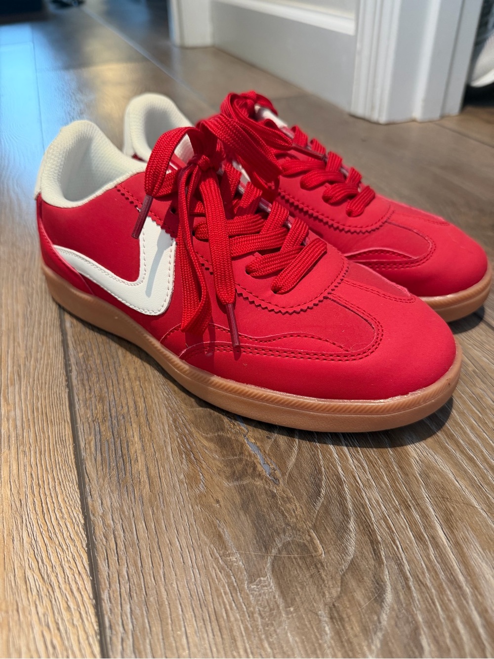 Red  Lucky Step sneakers feature a comfortable air-cooled insole for daily wear.